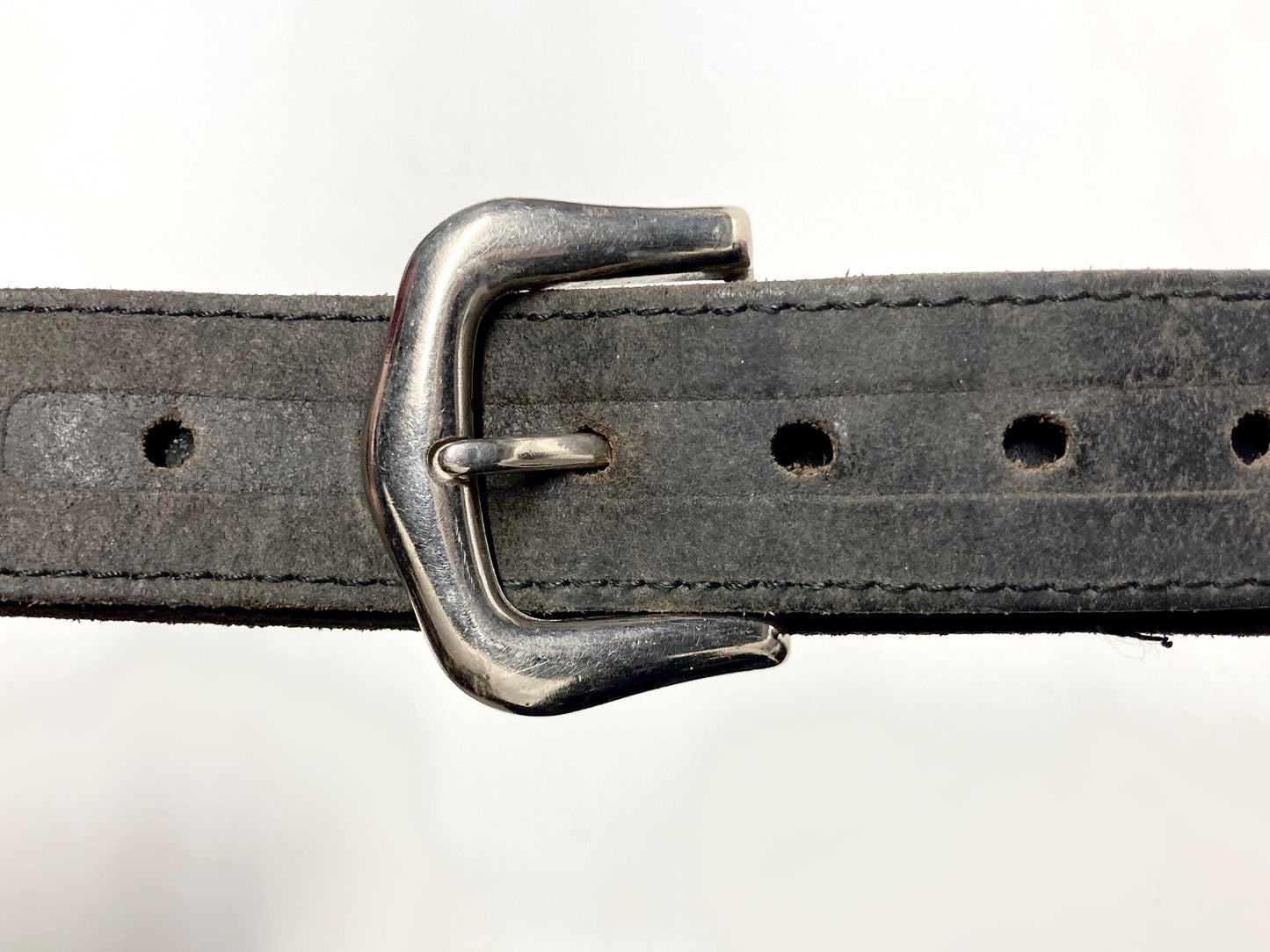 70s vintage black thick genuine leather belt with silver buckle by Camel. Subtle embossed patterns and big logo. For jeans and trousers