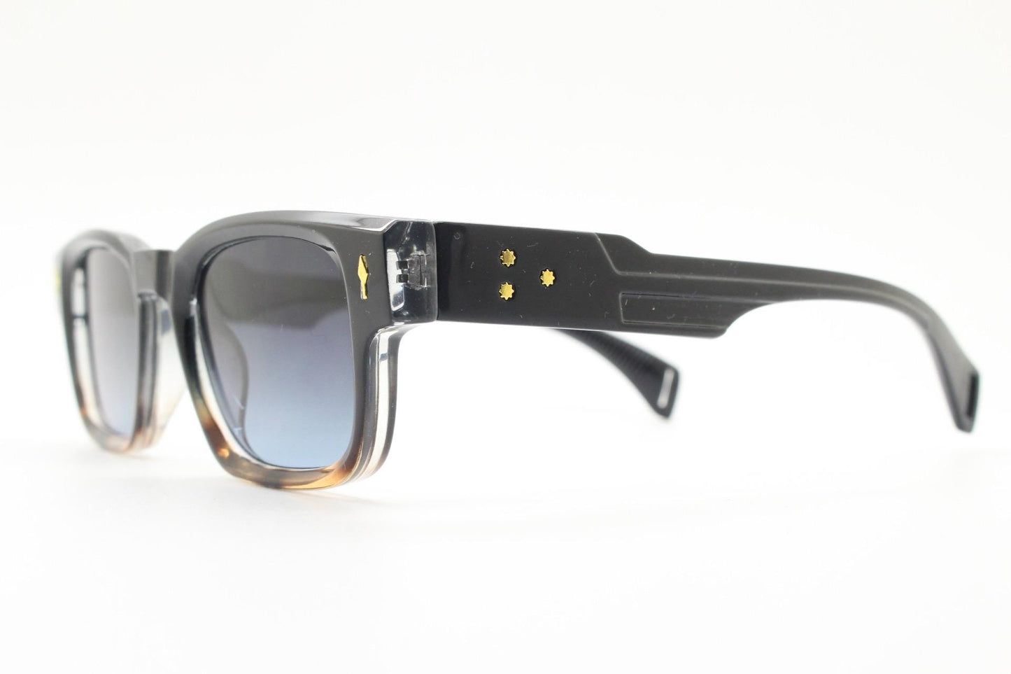 Vintage 90s low profile thick frame sunglasses. Black and tortoise ombre frame with graduating grey lenses. Unused NOS. One off sample