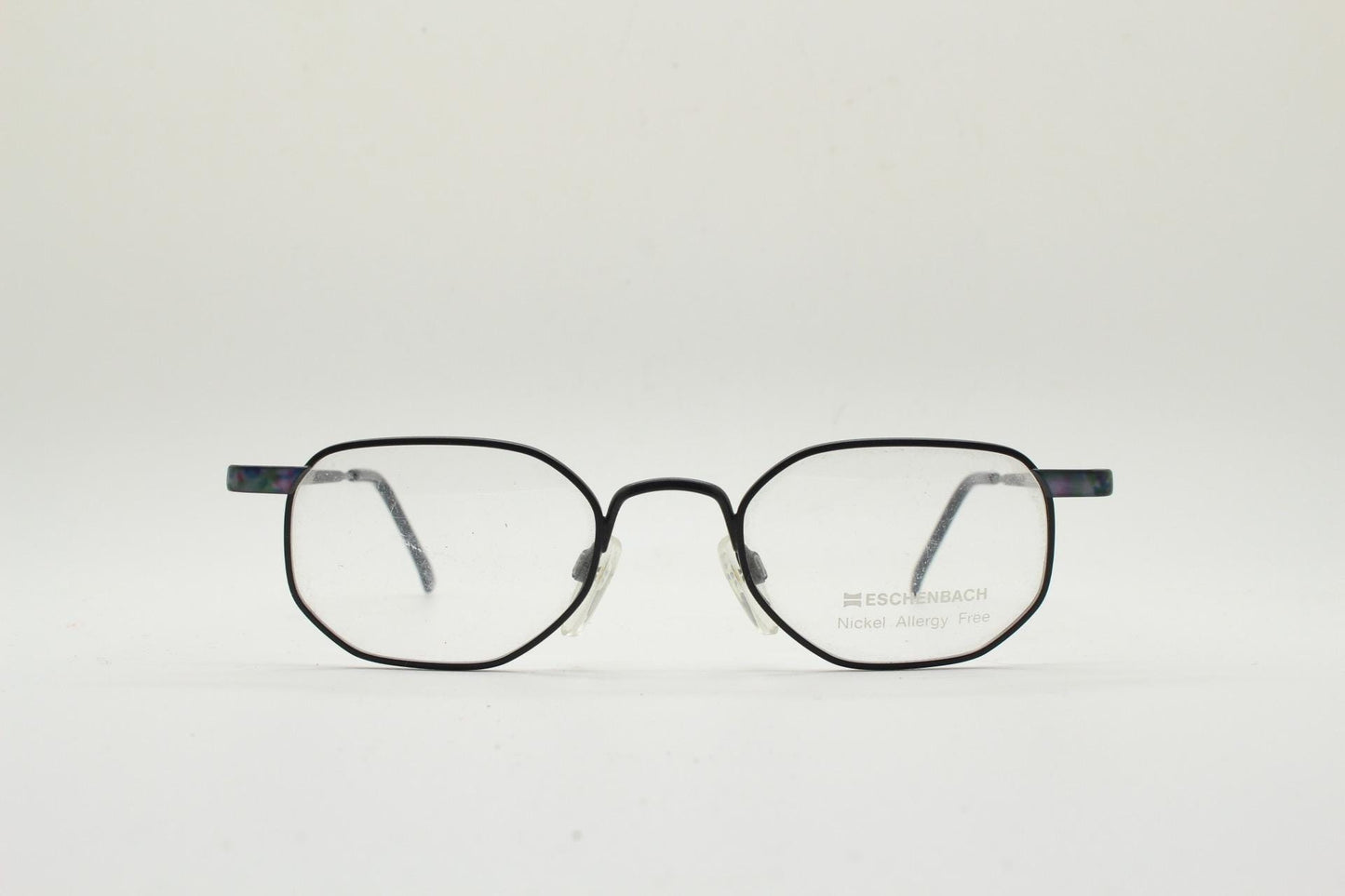 Eschenbach 90s vintage angular octagon eye glasses. Sharp matt black optical frame with blue marbled arms. Prescription RX spectacles. NOS