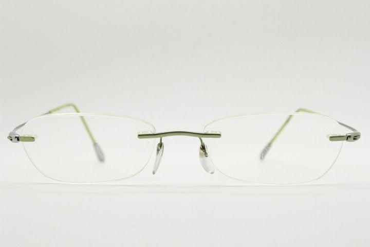 Silhouette rectangular frameless eye glasses made in Austria. Minimal lightweight optical frame with silver trim. Prescription RX