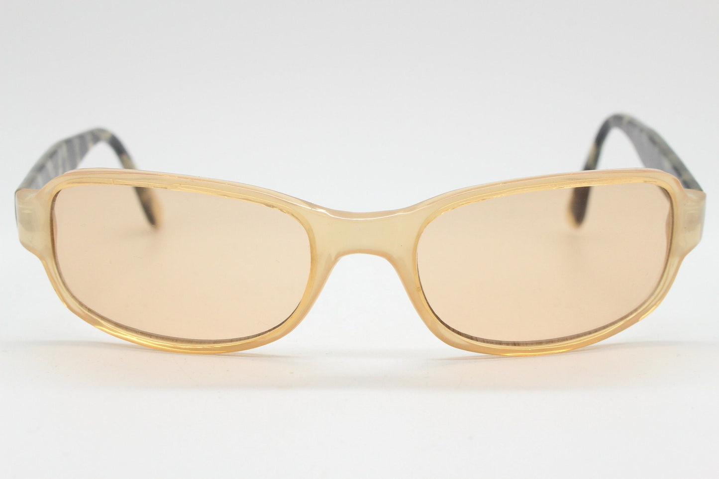 Y2K vintage curved rectangular sunglasses. Beige frame with matching lenses and contrasting tortoise arms. 2000s unused NOS. 00s