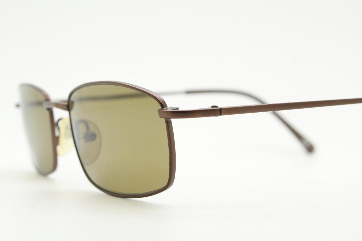 90s vintage rectangular low profile metal sunglasses. Minimal slim metal frame in satin bronze finish with plain brown lenses. NOS. BNWT