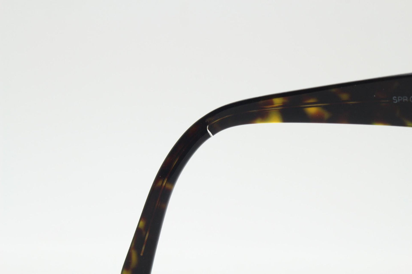 Prada rectangular wrap around eyeglasses made in Italy. Tortoise curving acetate optical frame with tall arms. Vintage prescription glasses