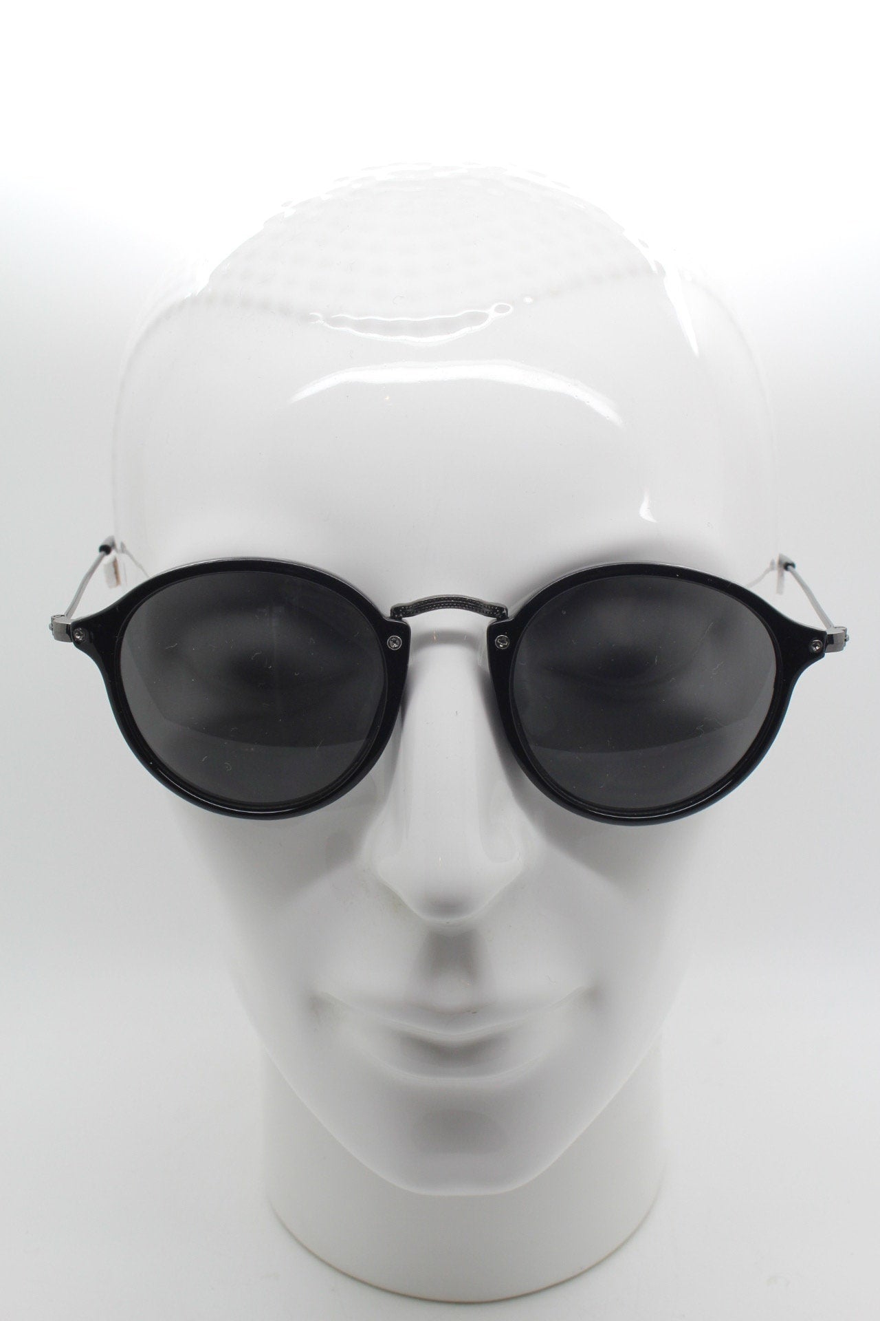 90s vintage round sunglasses. Black gloss slim 30s 40s design frame with metal bridge and dark lenses. Unused NOS