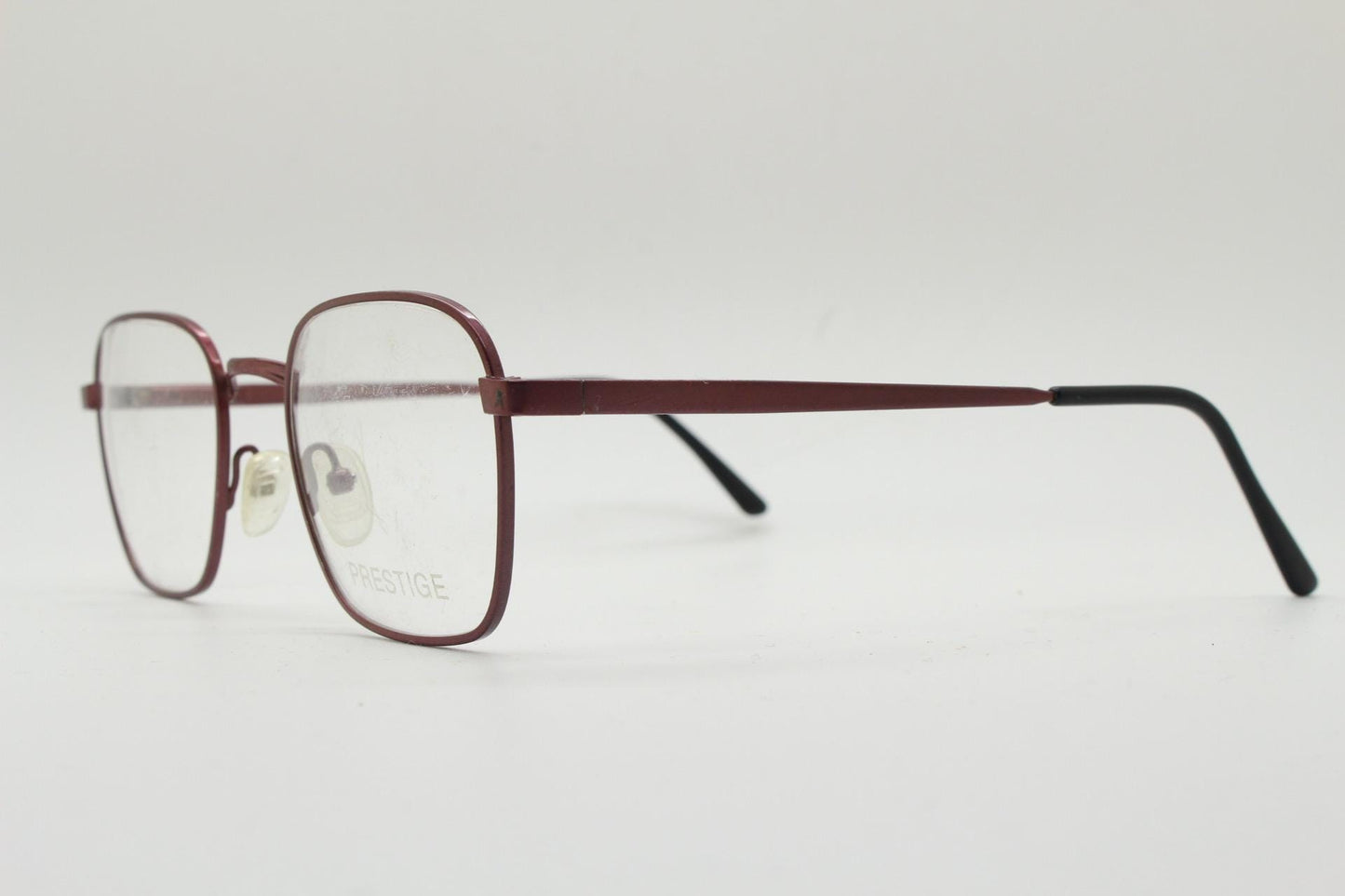 Prestige 90s vintage square metal eye glasses. Straightforward minimal design optical frames in attractive metallic brown. Prescription RX