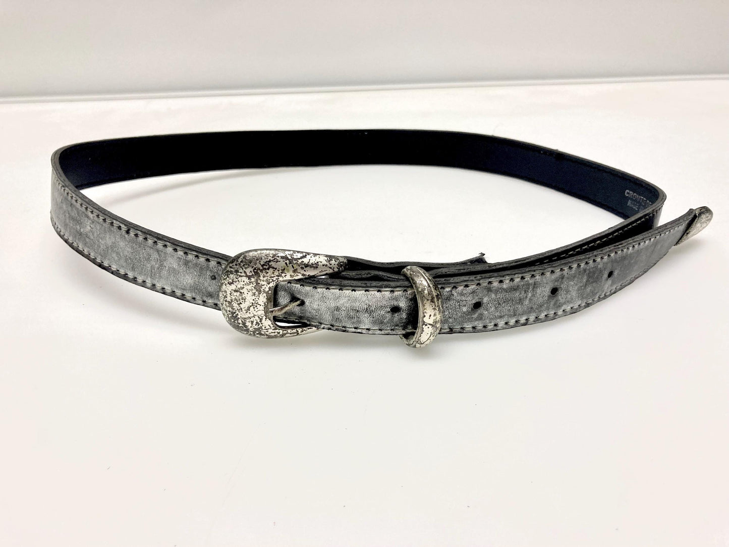 90s vintage womens dress or jeans / trousers belt in distressed worn metal looking finish. Vinyl on leather construction. Made in France