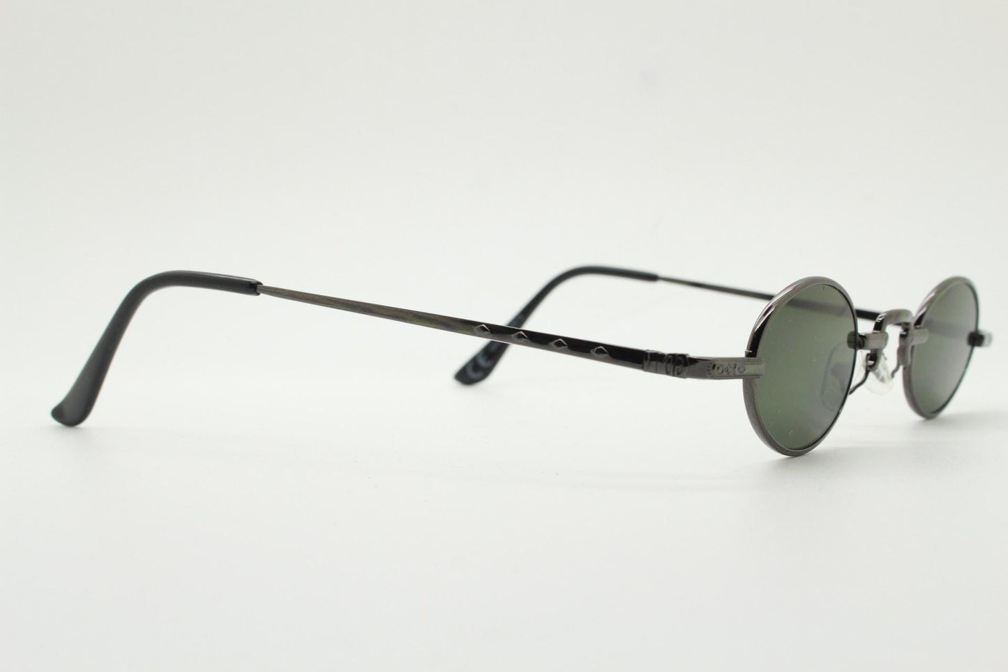 90s vintage small oval sunglasses. Imposing minimal grey metal victorian style frame with green lenses. Steampunk. Micro. Unused NOS