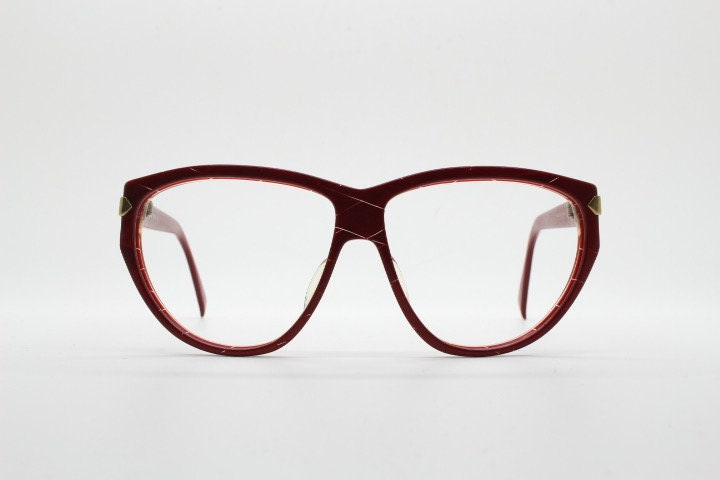 Silhouette 80s vintage oversized cat eye glasses made in Austria. Dramatic red prescription optical frame with subtle criss cross stripes RX