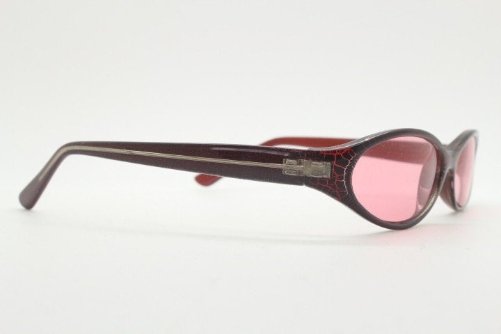 90s vintage abstract oval sunglasses. Thick curve around pink frame with psychedelic light pink lenses. Super villain mini mask. Cosplay NOS