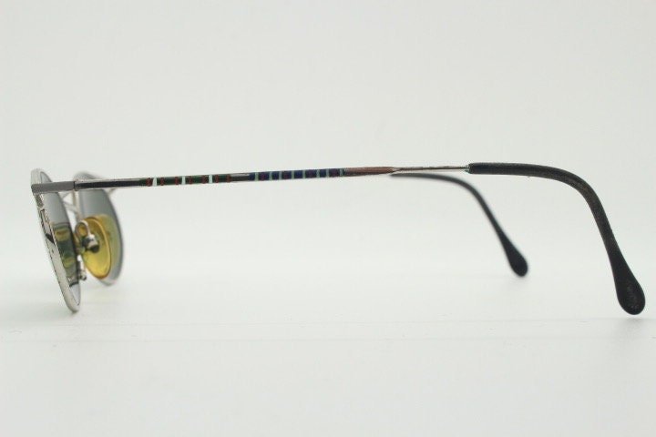 Taxi 90s vintage oval sunglasses. Unique innovative abstract design with extraordinary multi colour print. Casanova