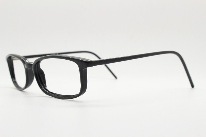 90s vintage modified wayfarer design eye glasses. Black low profile slim optical frames. Prescription eyeglasses. RX Spectacles. NOS
