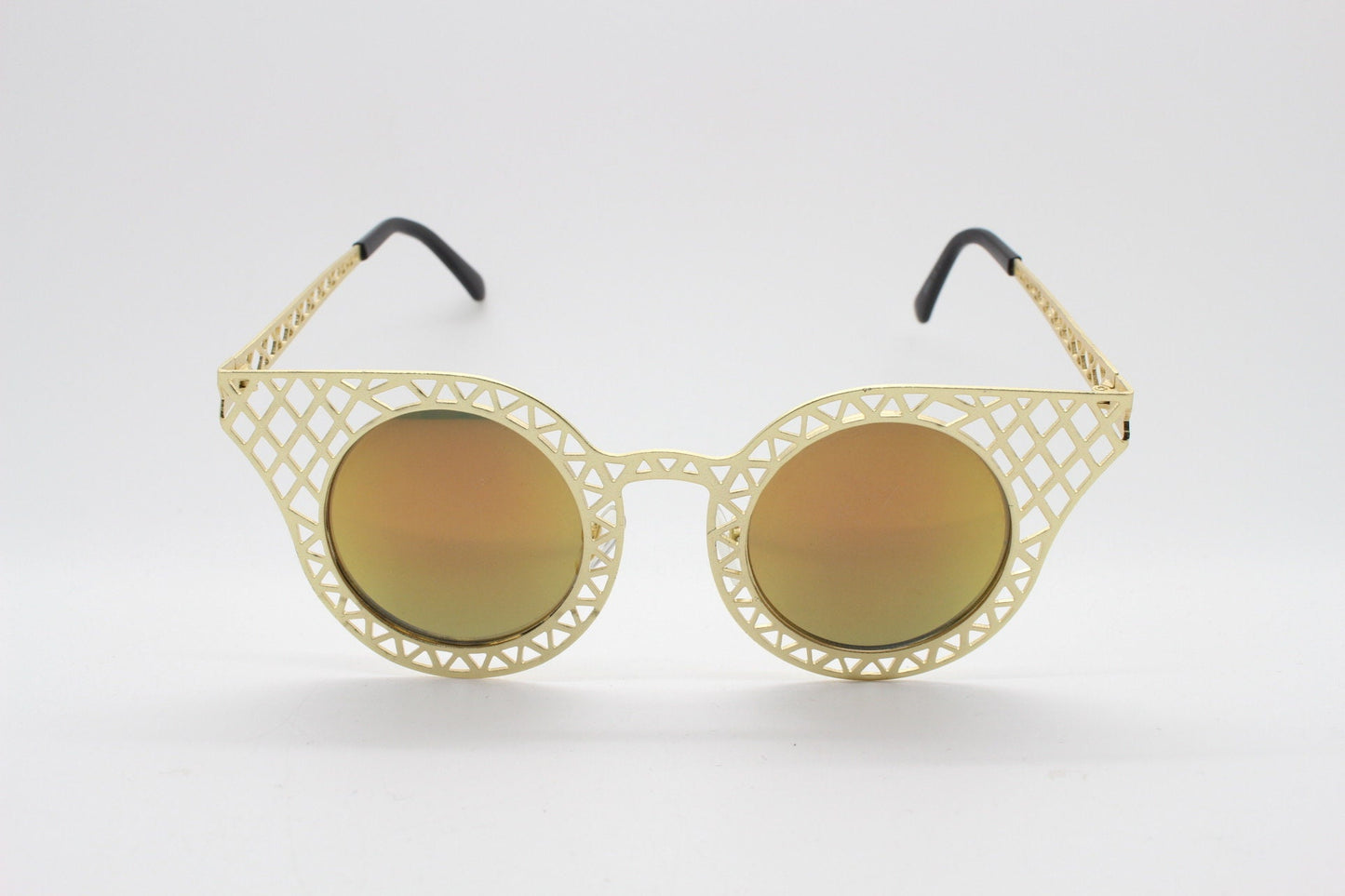 Y2K vintage metal cat eye sunglasses. Women's gold cut out lattice scaffold cateye frame with goldburst mirror lenses. 2000s. BNWT