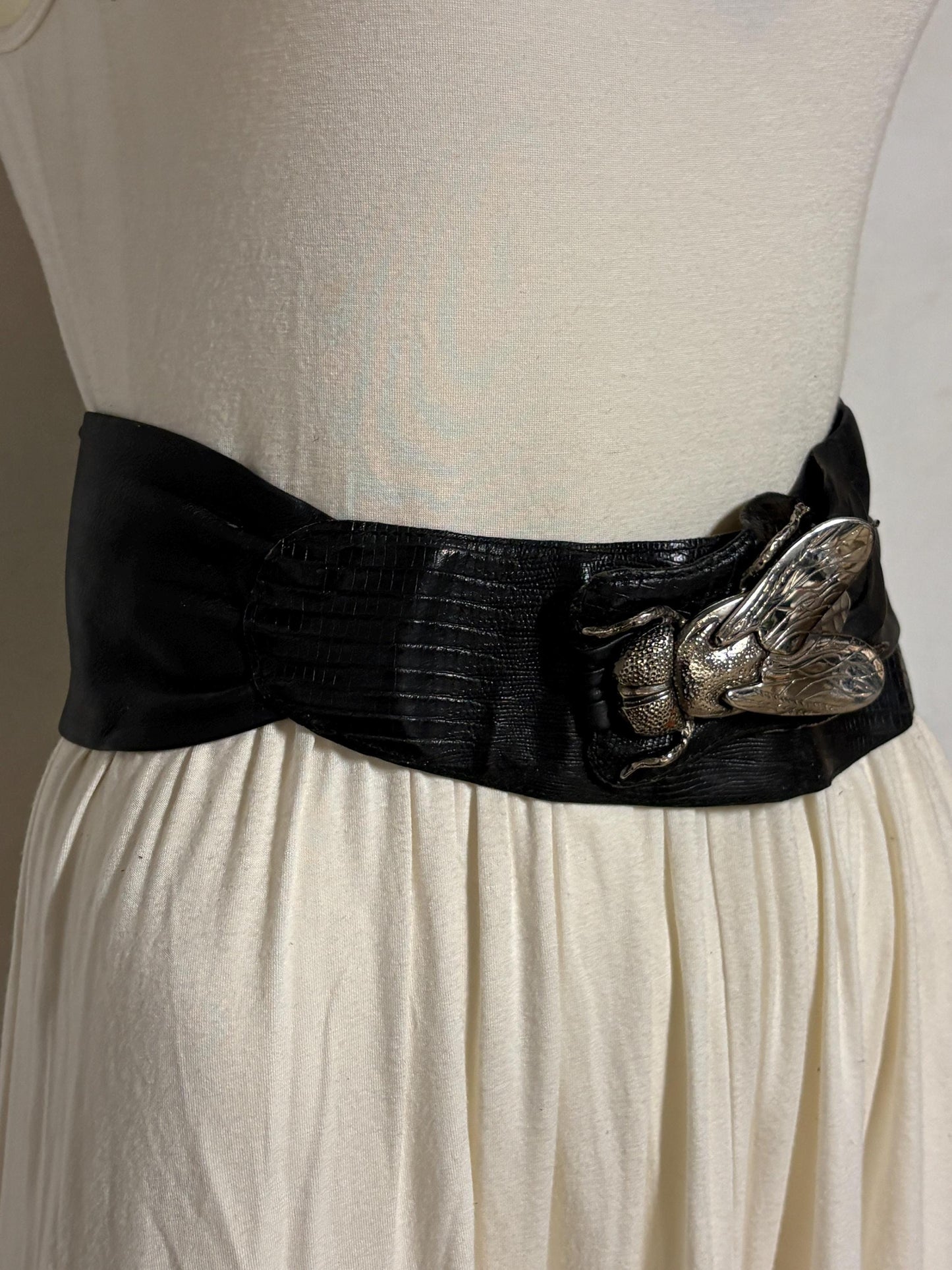 80s vintage womens black real leather dress belt with substantial dramatic big fly metal buckle. Womens sash. Statement feature belt