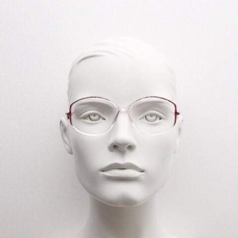 Silhouette 80s vintage hexagon eye glasses made in Austria. Transparent crystal optical frame with abstract red pattern. Prescription RX