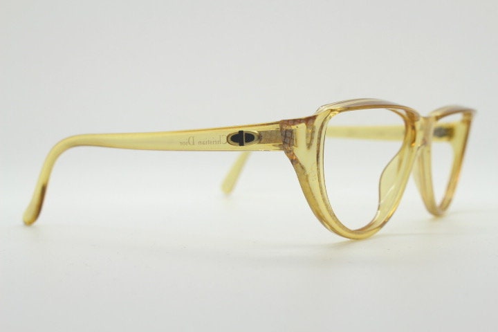 Christian Dior 80s vintage flat top cat eye glasses made in Germany. Transparent yellow optical frame with abstract print. Prescription RX