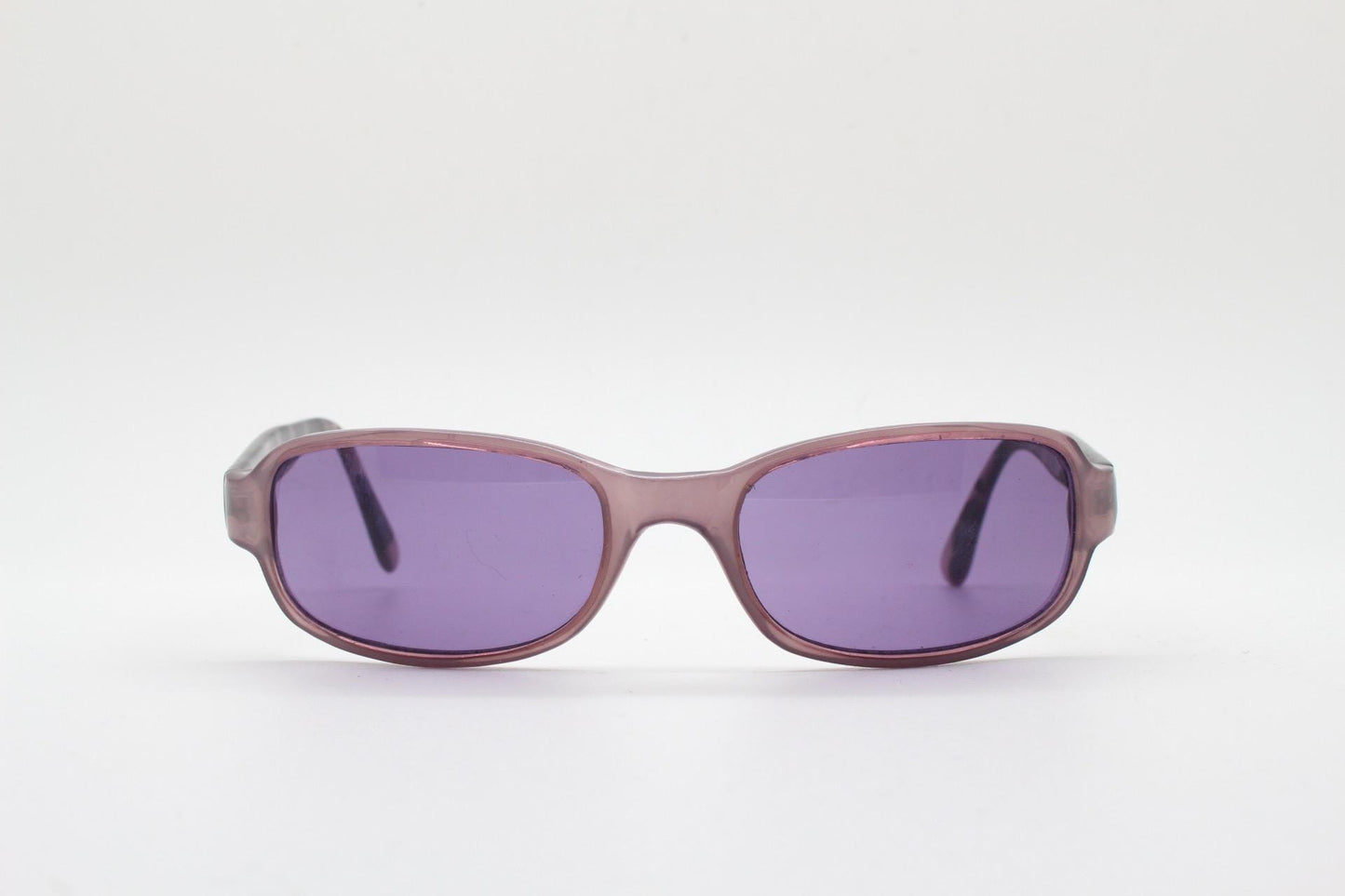 Y2k vintage wrap around sunglasses. Curved low profile frame with extraordinary purple turtle arms and well matched lenses. 2000's NOS
