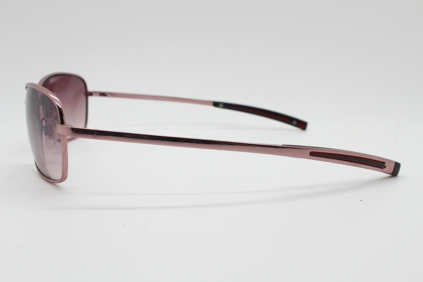 Y2K vintage curved sunglasses. Unusual Pink chrome metal frame with matching flared rectangular lenses. Unused 2000s NOS