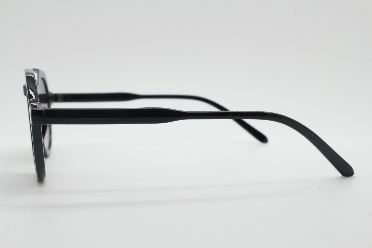 Vintage round flat top sunglasses. 30s, 40s design in black gloss frame with graduating lenses. Unused NOS