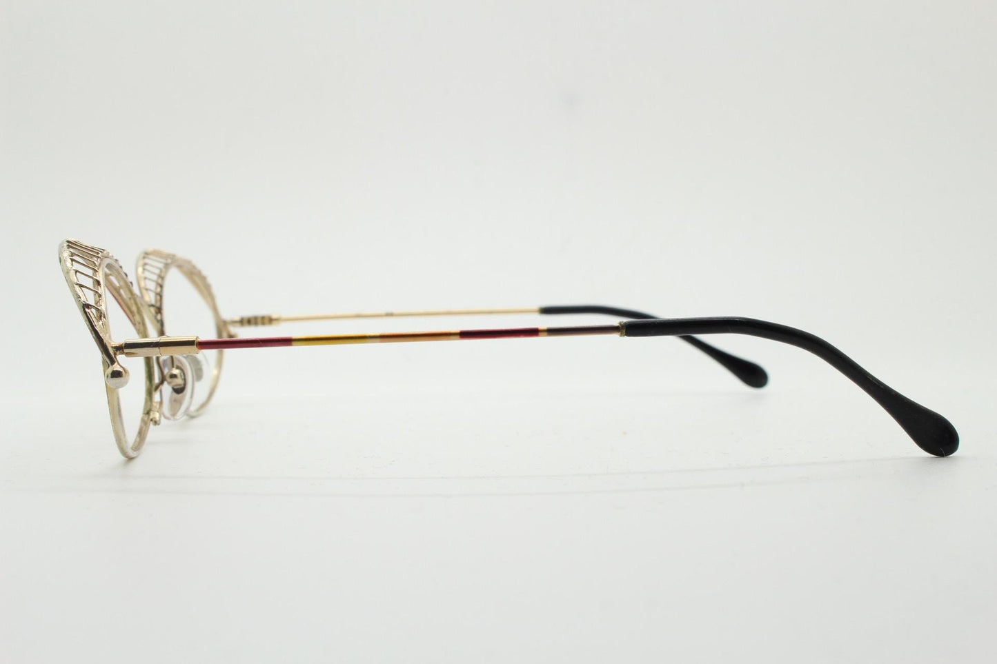 Casanova 80s vintage oval eye glasses. Incredible eyebrow canopy design with multi coloured finish. Optical frames. Prescription spectacles