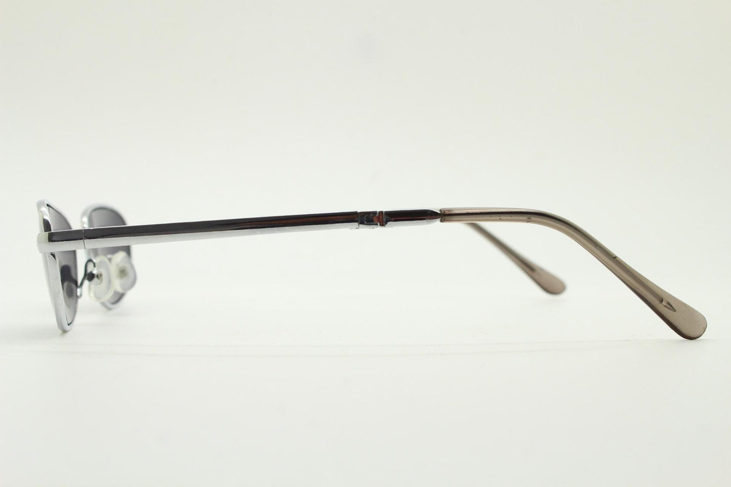 90s micro foldable rectangular sunglasses. Dark grey lenses in a small chrome folding compact frame. Folder. Rave 2000s. Y2K NOS