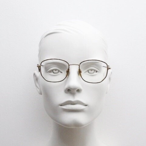 Giorgio Armani 90s vintage angular squared eye glasses made in Italy. Subtle metallic satin tiger print optical frames. Prescription RX