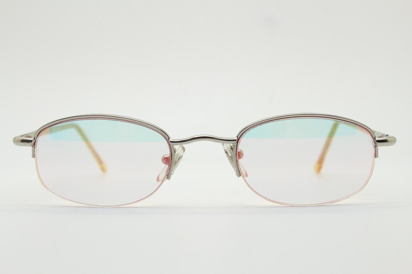 90s vintage small rectangular sunglasses. Silver chrome half frame with light tone lenses with gold mirror glaze. 2000's. Y2K. NOS micro