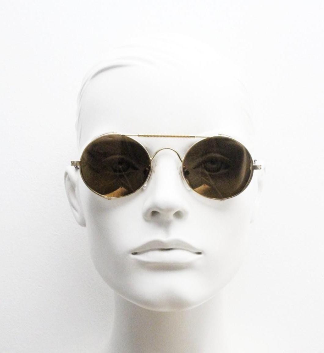 Farrows by Linda Farrow vintage 80s goggle sunglasses model 365. Gold chrome glacier design with matching mirror lenses. Blinkers. NOS