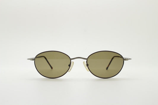 90s oval vintage metal sunglasses. Minimal satin finish bronze and brown metal frame with kinked curving arms. Steampunk. Unused NOS
