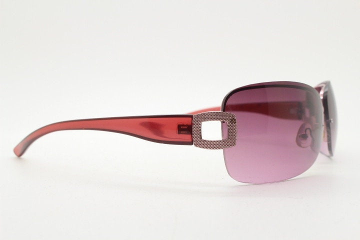 Y2K vintage rectangular purple sunglasses. Half frame 2000's wrap around with lethal mulberry curved lenses, gold trim and temple crests