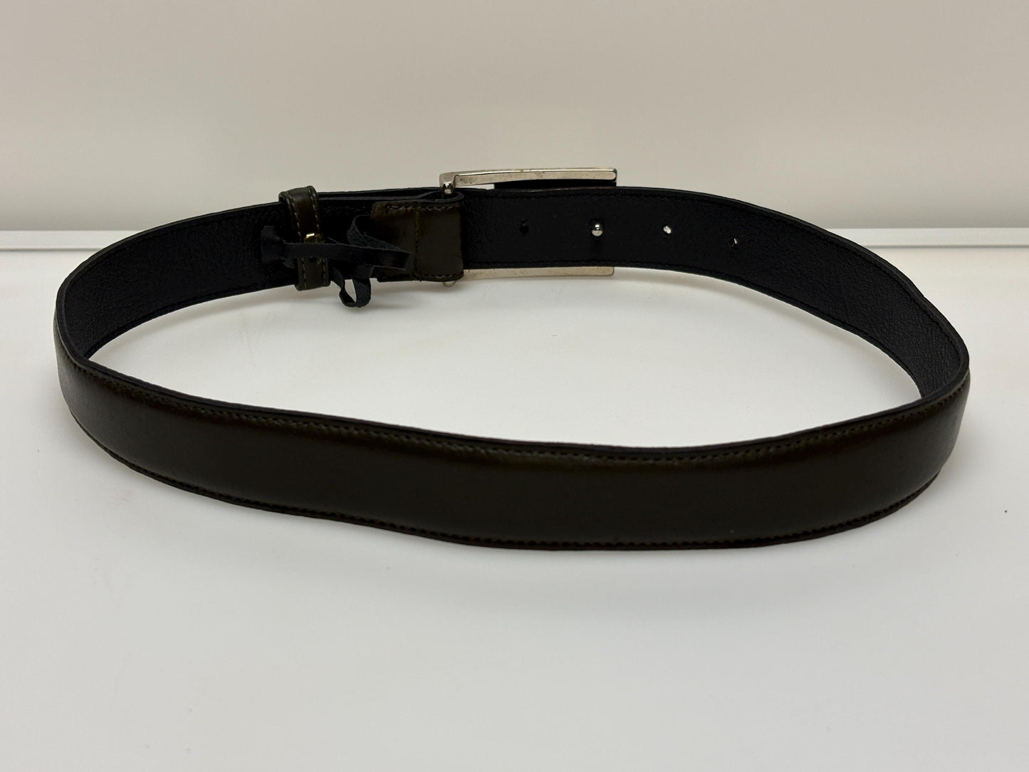 90s vintage smart trouser / jeans belt in dark green genuine leather with solid shiny chrome buckle. Made in France. NOS