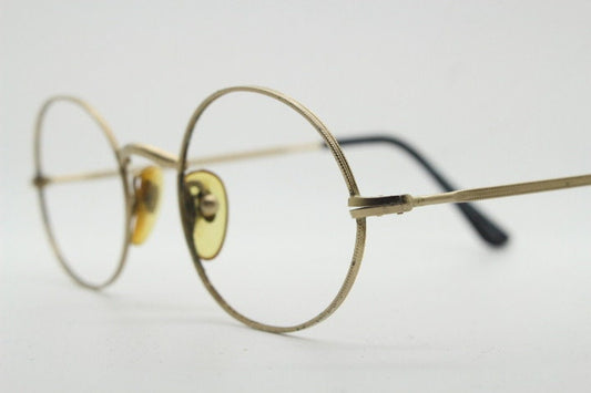 Giorgio Armani 90s vintage oval eye glasses made in Italy. 30s design gold optical frames in a satin finish. Prescription RX