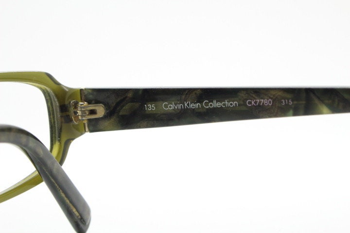 Calvin Klein Collection rectangular low profile eye glasses. Dark marbled grey acetate optical frames. Prescription eyeglasses. Vintage RX
