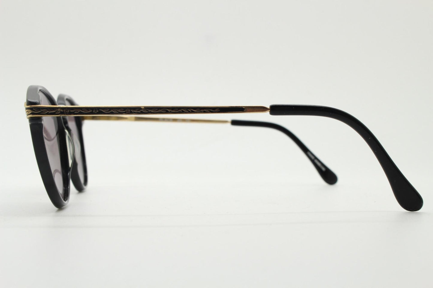 Laura Ashley 90s vintage round sunglasses. Refined 1940s design in black acetate with ornate embossed metal arm details. Unused NOS
