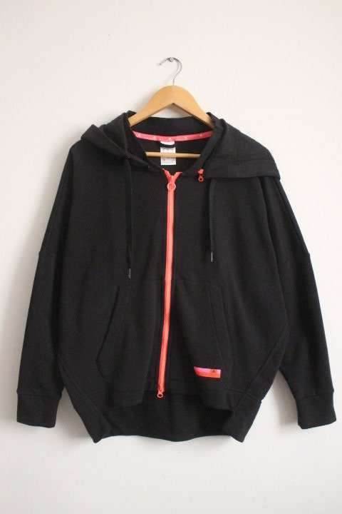 Stella Mc Cartney for Adidas Stellasport vintage zipper hoody. Black batwing track top with pink double zip detachable hood and tail section