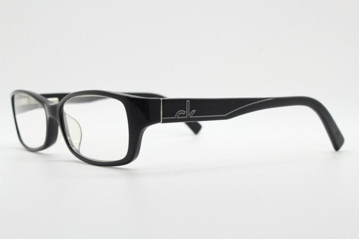 Calvin Klein rectangular glasses model 5714. Black gloss low profile acetate optical frames. Prescription eyeglasses. RX vintage spectacles