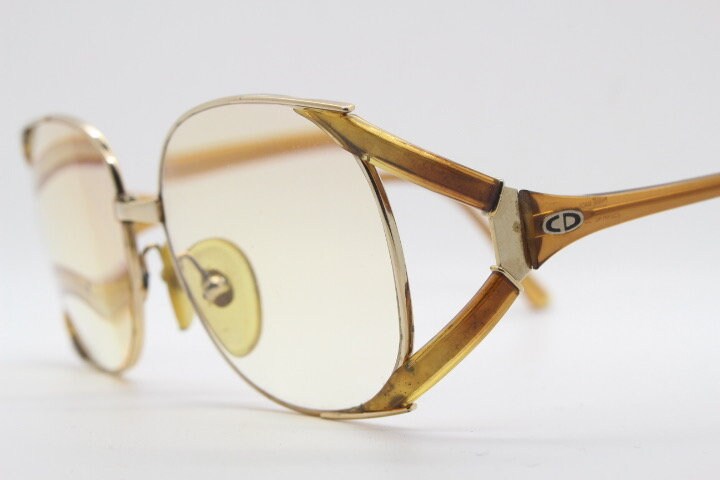 Christian Dior 70s vintage round eyeglasses model 2524 made in Germany from Optyl. Transparent brown optical frame. Prescription eyeglasses