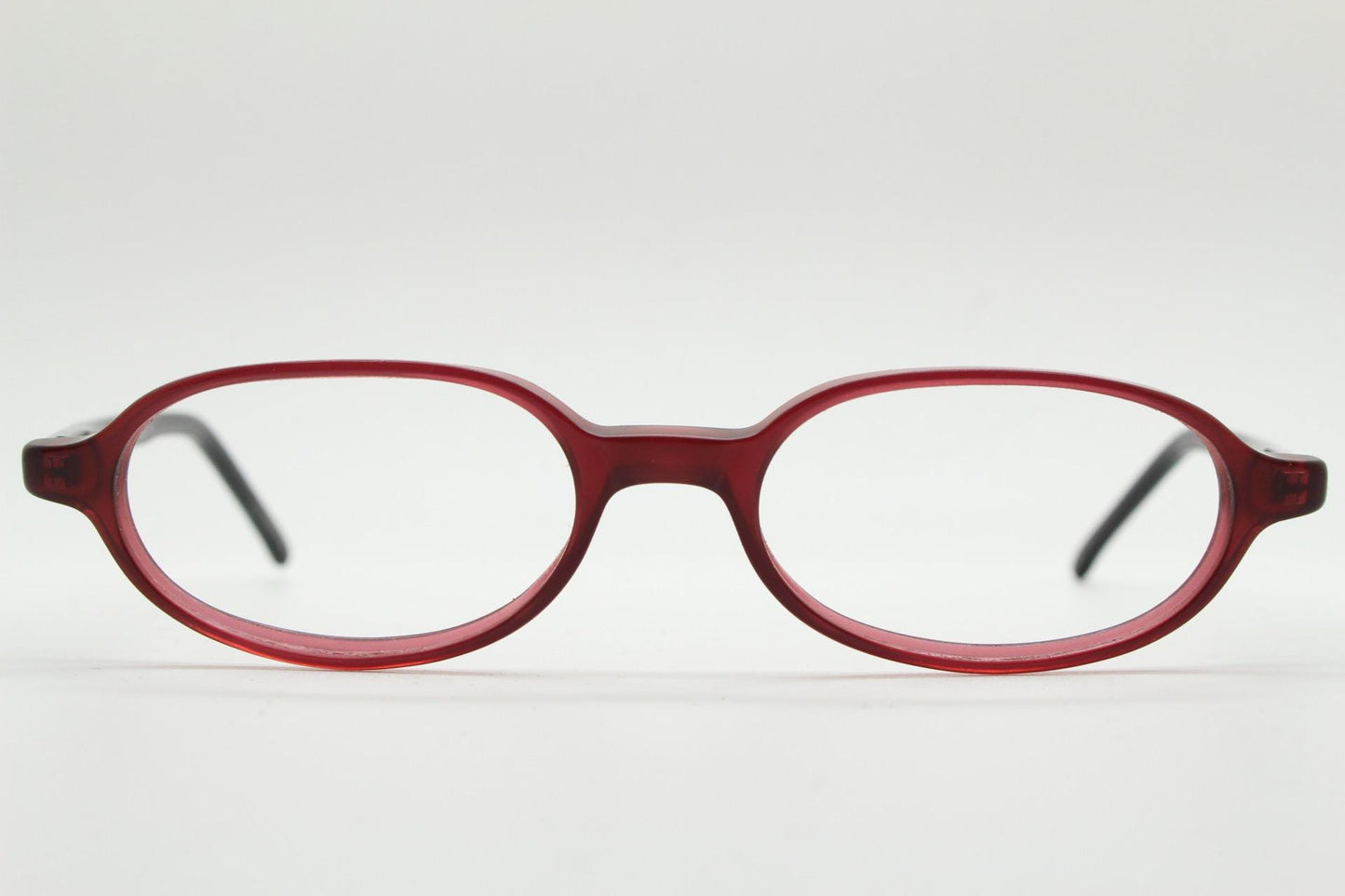 Diesel small oval eye glasses. Transparent brown front with black gloss arms. Acetate optical frames. Prescription 90s Vintage RX Spectacles