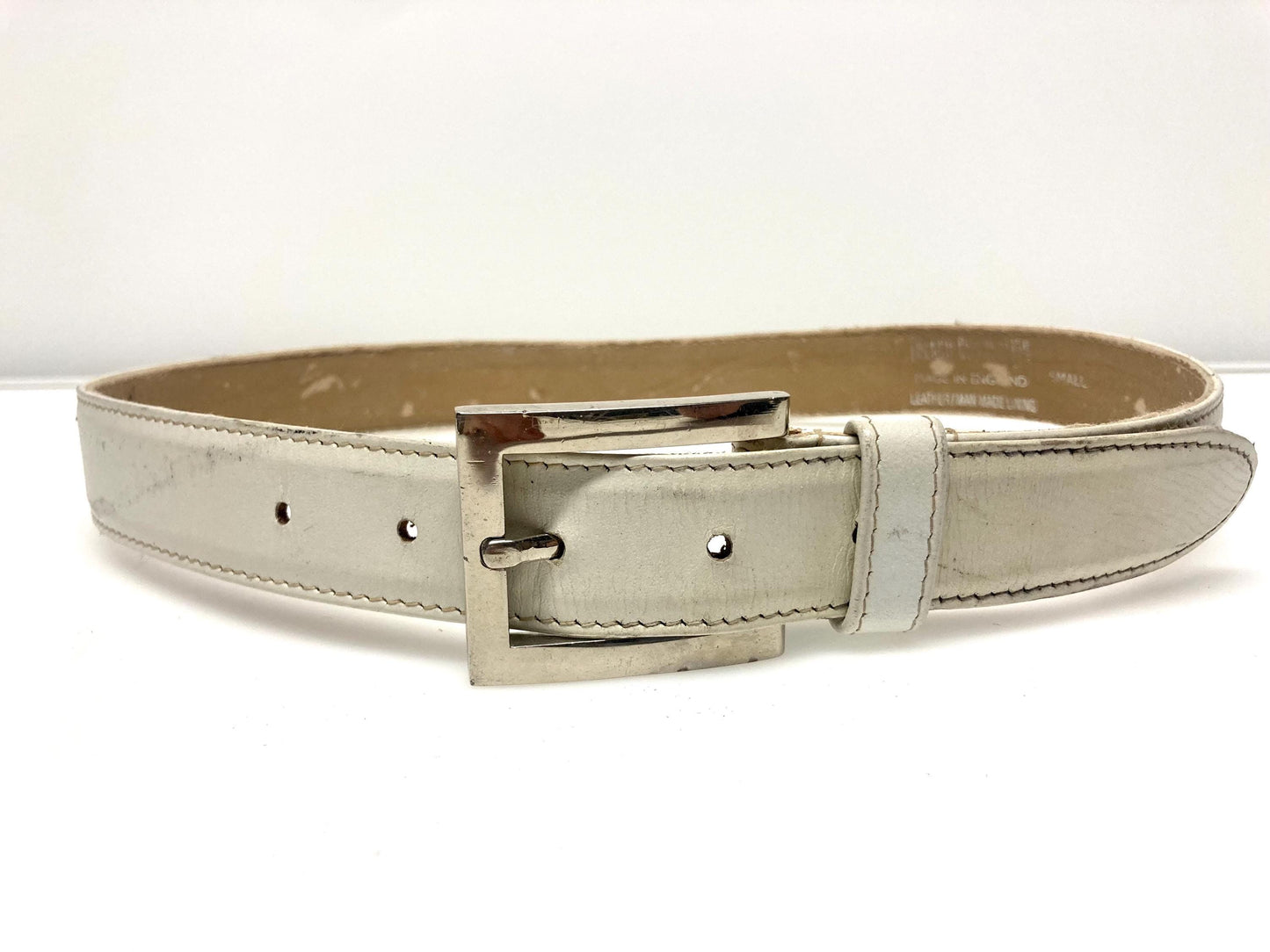 90s vintage womens dress or jeans belt by French Connection. Plain white genuine leather with chrome solid brass buckle. Made in England