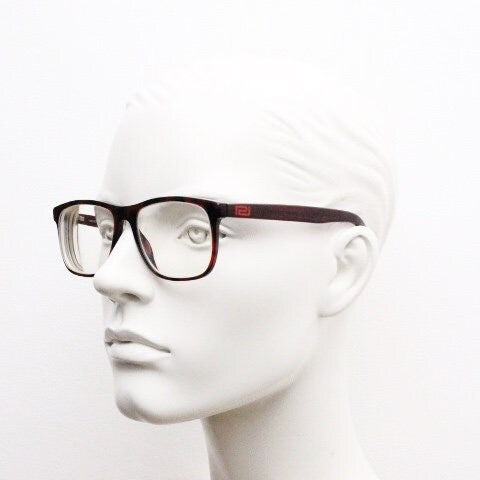 Versace modified wayfarer design eye glasses made in Italy. Mottled brown acetate optical frames with subtle logo. Prescription eyeglasses