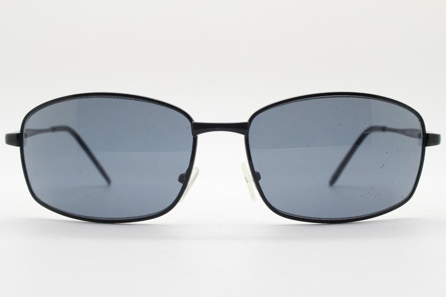 90s vintage wide rectangular sunglasses. Solid metal plain black gloss finish frame with curved lenses. 2000's. Y2K. NOS