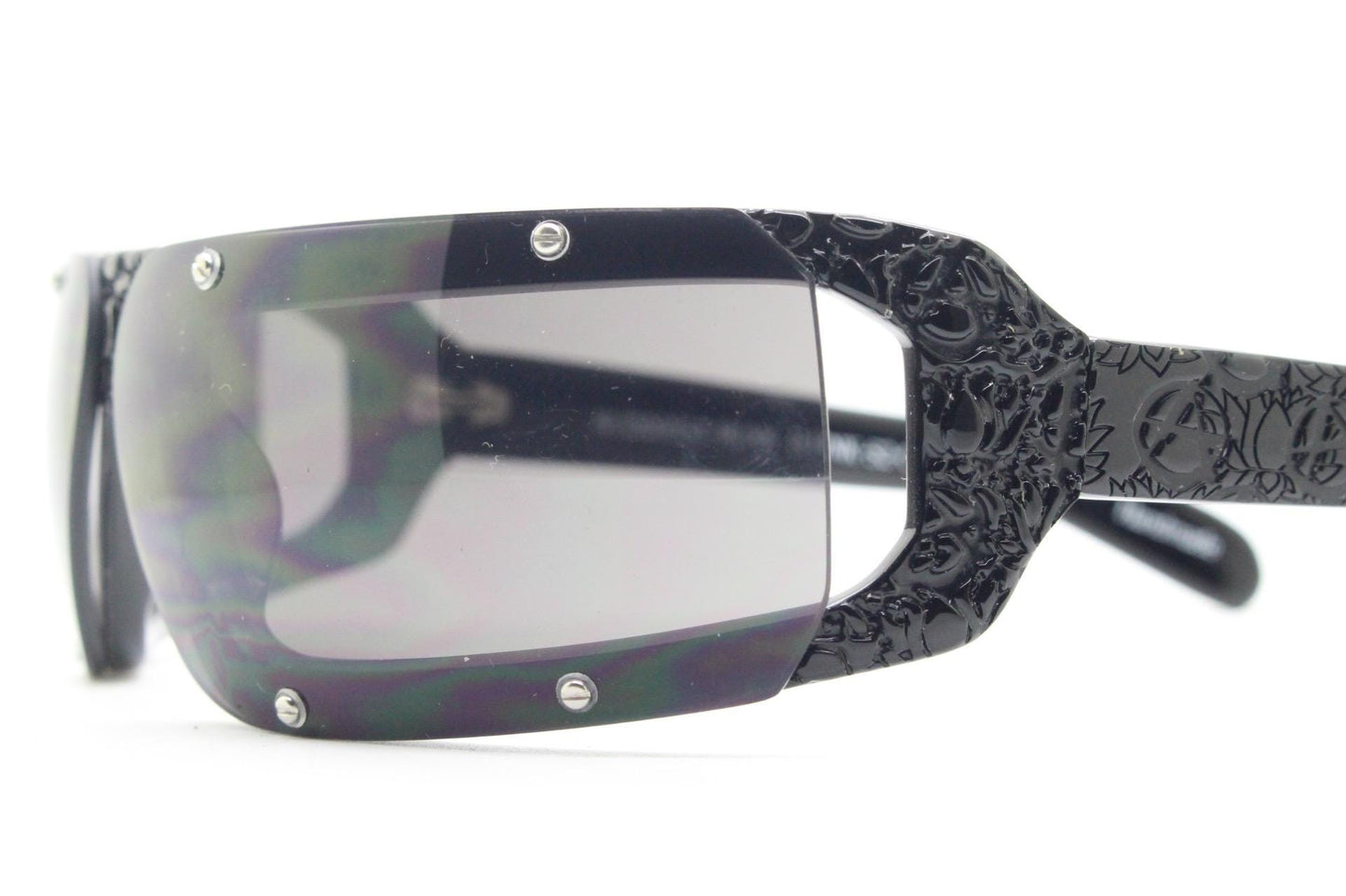 Buddhist Punk wrap around sunglasses hand made by Linda Farrow. Black acetate frame with abstract cut out patterns. Projects. Vintage. NOS