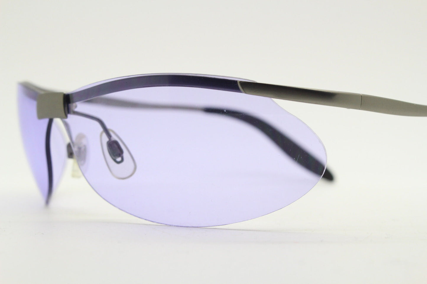 Y2K vintage sport shield sunglasses. 2000's half frame wraparound aerodynamic mini mask visor with purple bug eye lenses. 90s 00s unused NOS
