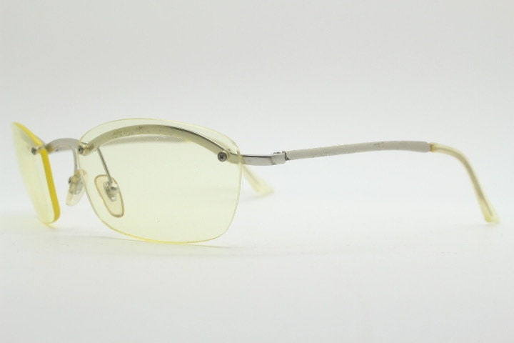 Y2K vintage half frame extra light tone yellow sunglasses with satin alloy brow line. Minimalistic 2000's wrap around design. 00's NOS