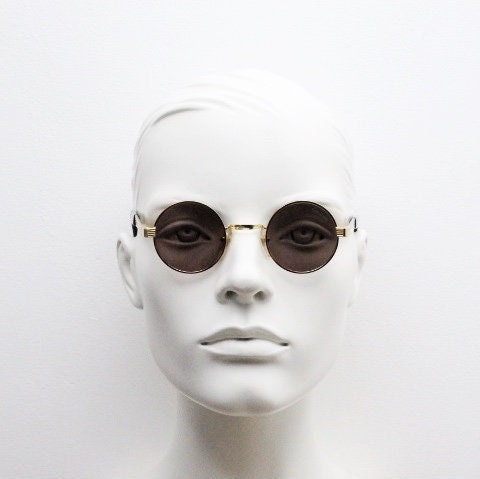 Optical City 90s vintage small round undersized sunglasses made in Italy. Handsome metallic tiger pattern on quality 1920s repro frame. NOS