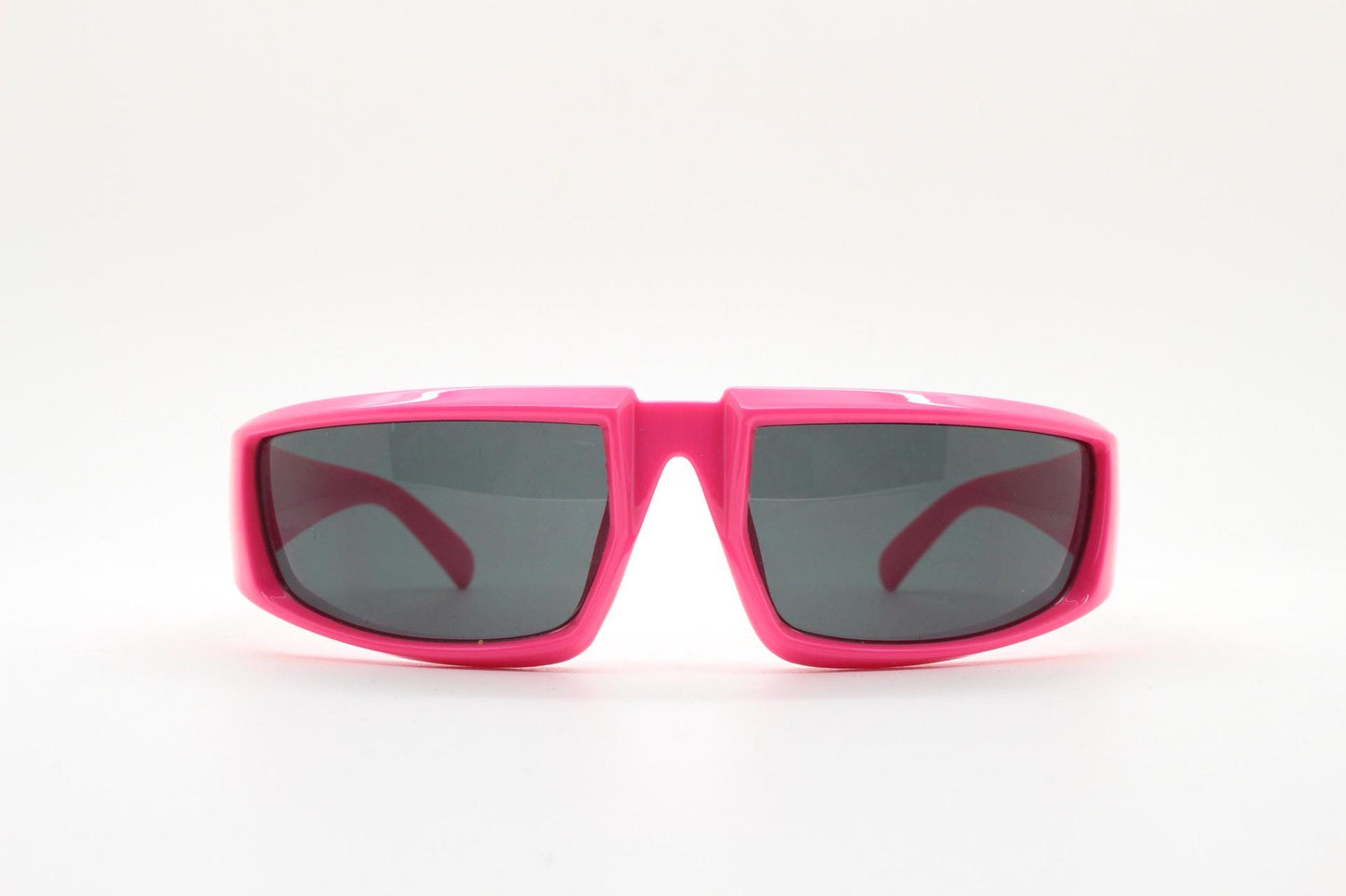 Y2k vintage 2 tone sunglasses. Shocking pink flat top shield style wrap around frame with black lenses. Fluorescent. Dayglo robot visor. NOS