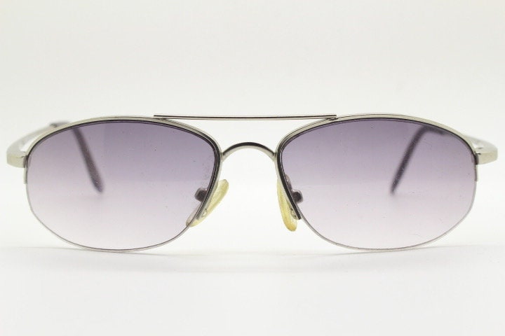 90s vintage modified extra small aviator sunglasses made in the USA. Satin finish solid metal frame aviators with light tone smoky lenses