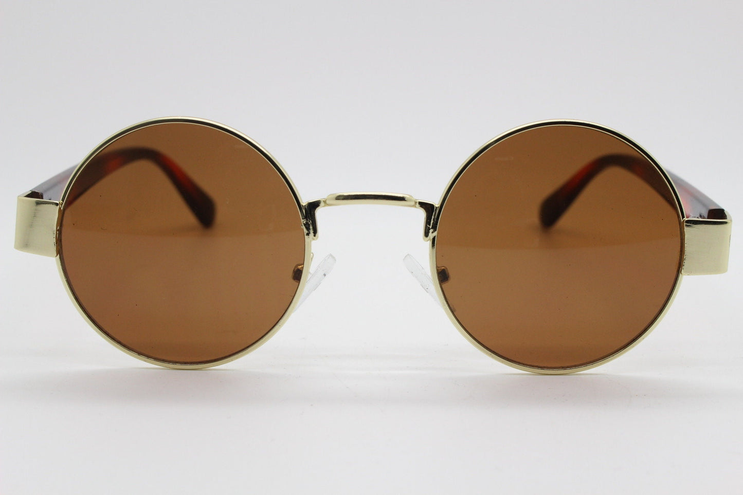 90s round vintage sunglasses. Gold 1920's style frame with tiger pattern arms and brown lenses. Unused. BNWT