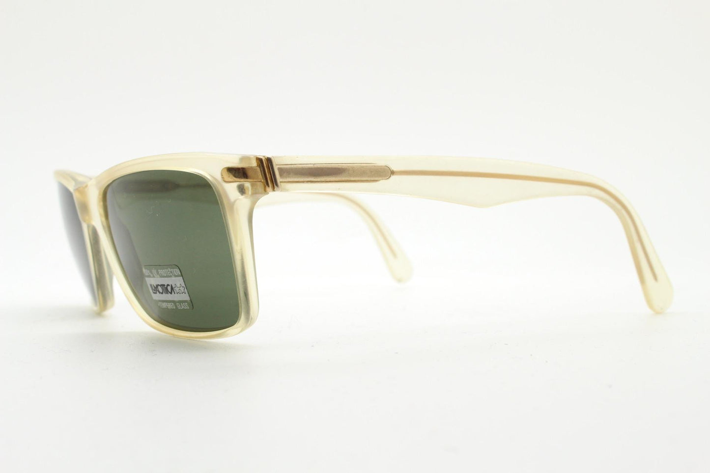 Luxottica 90s vintage rectangular sunglasses made in Italy. Transparent yellow acetate chunky frame with contrasting dark green lenses. BNWT