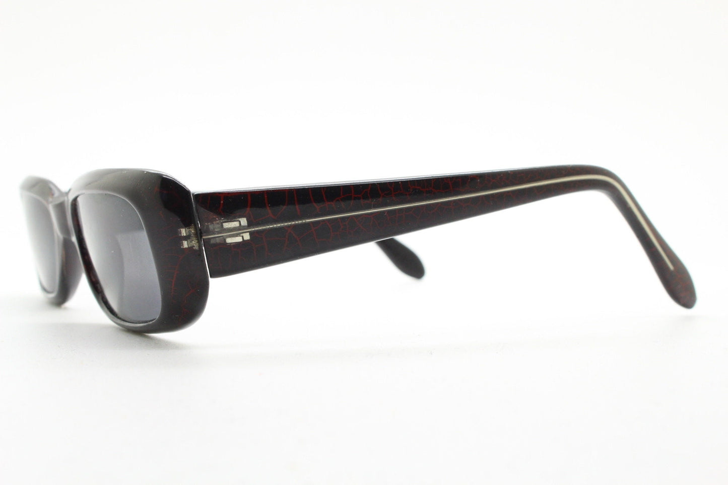 90s authentic vintage abstract rectangular sunglasses. Thickened black frame with red crackle print. NOS