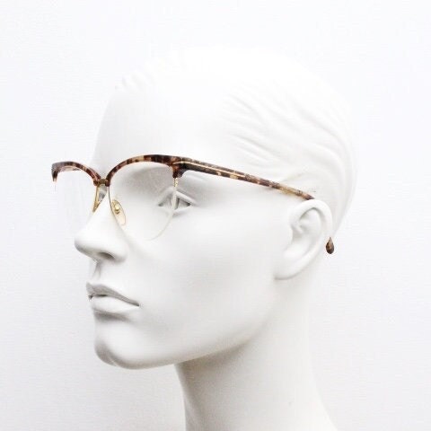 Versace 90s vintage brow line cat eye glasses made in Italy. Elegant tortoise acetate cateye optical half frames. Prescription RX eyeglasses